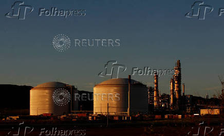 FILE PHOTO: The Woodside gas plant is seen at sunset in Burrup at the Pilbara region in Western Australia