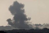 Smoke rises from Gaza after an explosion