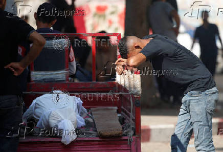 Funeral for Palestinians killed by Israeli fire while seeking aid in northern Gaza