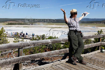 National Park Service Seasonal Interpretation Ranger Denine Northup leads a program at the Fountain Paint Pot geothermal area in Yellowstone National Park