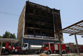 Overnight fire at a shopping center kills dozens of people, in al-Kut