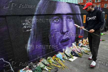 Fans pay tribute following the death of Ozzy Osbourne, in Birmingham
