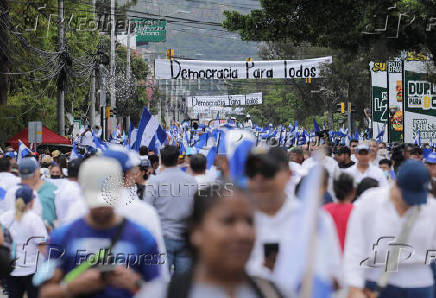 Supporters of the National Party of Honduras hold a march in Tegucigalpa