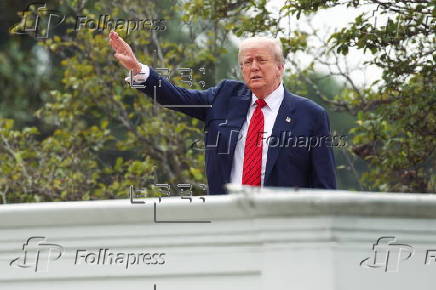 US President Trump walks on roof of the West Wing of the White House