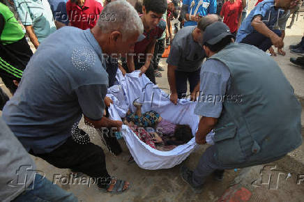 Palestinians mourn loved ones killed in Israel strike, in Gaza City
