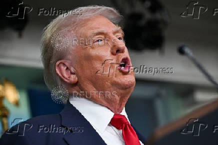 U.S. President Trump meets members of the media at the White House in Washington, D.C.