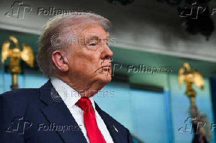 U.S. President Trump meets members of the media at the White House in Washington, D.C.
