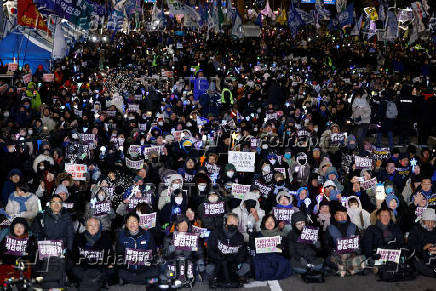 Protests on the first anniversary of former President Yoon Suk Yeol's December 3, 2024 martial law declaration, in Seoul