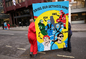 Greenpeace paints mural outside South Korea Embassy
