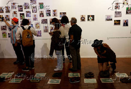 People attend an exhibition called 