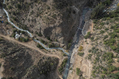 Chilean volunteers combat plastic waste in the Mapocho river, in Santiago