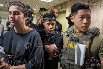 U.S. federal immigration officers operate at immigration court in New York