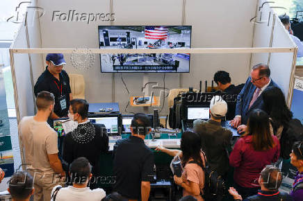 People visit Ocean Aero's booth at a sea drone event in Yilan