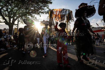Revelers attend J'ouvert celebration on the day of the annual West Indian Day parade in the Brooklyn borough of New York