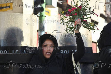 Evo Morales supporters march in mourning amid economic crisis, in La Paz