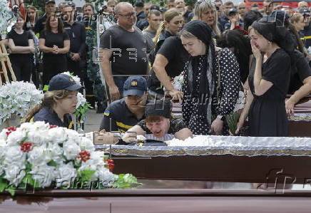 Farewell ceremony for three Ukrainian rescuers in Kyiv