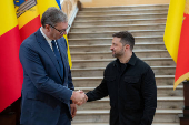 Ukraine's President Zelenskiy and Serbian President Vucic shake hands during the Fourth Ukraine?Southeast Europe Summit in Odesa