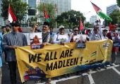 Pro Palestinians protest outside the US embassy in Jakarta
