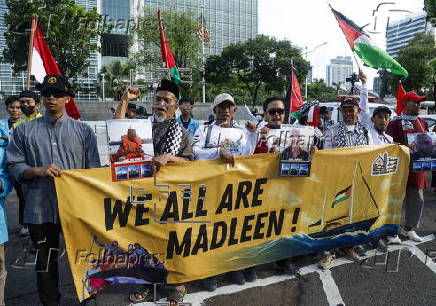 Pro Palestinians protest outside the US embassy in Jakarta