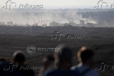Israeli right wing activists take part in a rally organized by settlers groups to promote Israel's resettling in Gaza