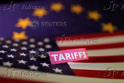 FILE PHOTO: Illustration shows U.S. and European Union flags and 