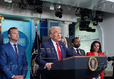 US President Donald Trump addresses the media at the White House