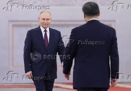 Russian President Putin and Chinese President Xi meet in Moscow