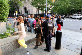 Members of the press waiting to enter the courthouse for the trial of Sean (P. Diddy) Combs at Federal District court in Manhattan