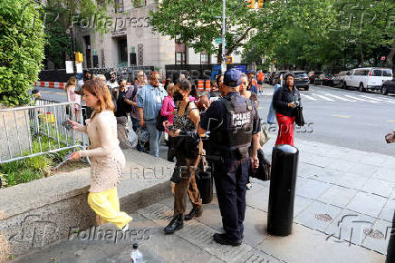 Members of the press waiting to enter the courthouse for the trial of Sean (P. Diddy) Combs at Federal District court in Manhattan