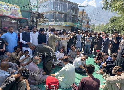 Mass funeral of 8 volunteers killed in a landslide near the Chinese border in Gilgit