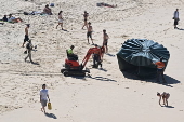 King tide swell destroys windows at Bondi Beach