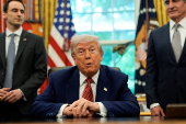 U.S. President Donald Trump signs executive orders at the White House in Washington