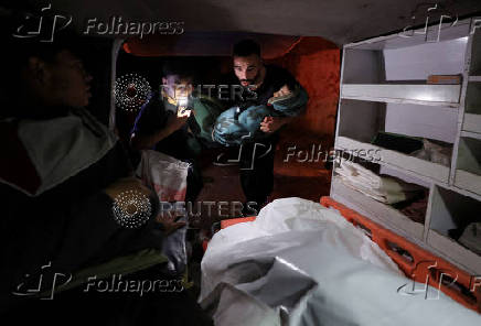 Bodies of Palestinians killed in an Israeli strike, at Al-Ahli Arab Baptist hospital, in Gaza City