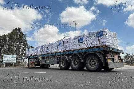 Trucks carrying aid are seen at the Kerem Shalom crossing between Israel and Gaza, on its Israeli side