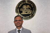 Reserve Bank of India (RBI) Governor Sanjay Malhotra arrives at a press conference in Mumbai