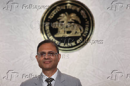 Reserve Bank of India (RBI) Governor Sanjay Malhotra arrives at a press conference in Mumbai