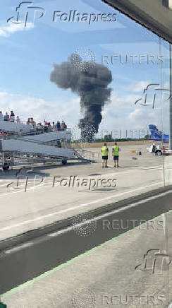 A plume of black smoke rises near Southend runway following small plane crash