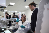 French President Macron inaugurates EssilorLuxottica laboratory in Wissous