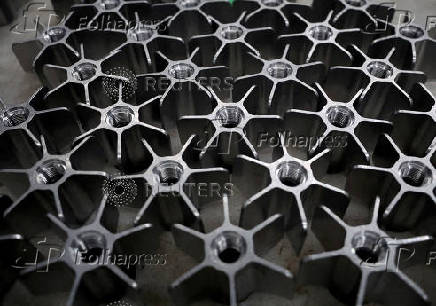 FILE PHOTO: Tail sections from an 81mm Mortar round await further assembly on the production line at the BAE munitions factory in Washington, Britain