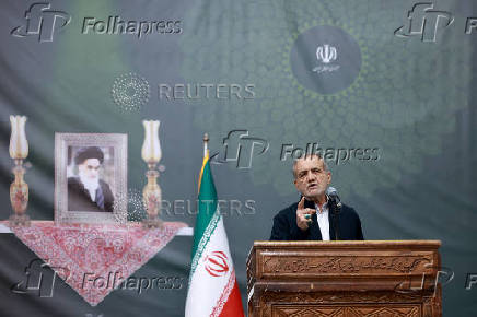 Iranian President Masoud Pezeshkian speaks during the 36th anniversary of the death of the leader of Iran's 1979 Islamic Revolution, Ayatollah Ruhollah Khomeini, at Khomeini's shrine in southern Tehran