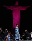 Models present creations by Alessa at the Christ the Redeemer statue to mark the launch of Rio Fashion Show, in Rio de Janeiro