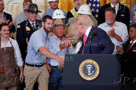 U.S. President Donald Trump holds a 