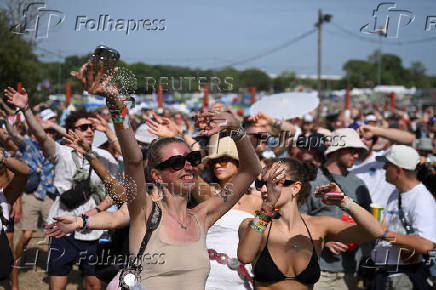 Revellers attend Glastonbury Festival at Worthy Farm in Pilton, Somerset, Britain
