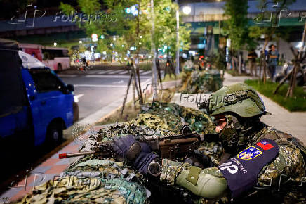 A soldier takes part in Taiwan's annual Han Kuang military exercises in Taipei