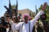 Fighters from Bedouin tribes deploy in the Druze-majority town of Mazra'a