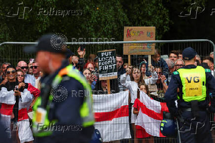 Protests outside a hotel used for housing asylum seekers, in Epping
