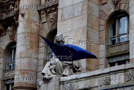 FILE PHOTO: The flag of the European Union flies on the building of the National Bank of Hungary in Budapest