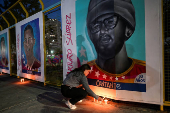 A Venezuelan sister keeps a vigil for her singer brother, after he was deported from the U.S. and jailed in El Salvador.