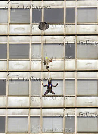 FILE PHOTO: Austrian Parachutist Felix Baumgartner jumps from Pirelli skyscraper