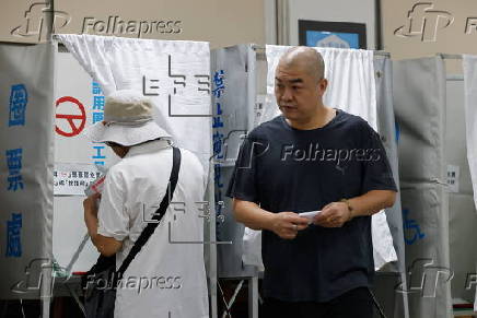 Voters cast their ballots in recall election for several Taiwanese legislators